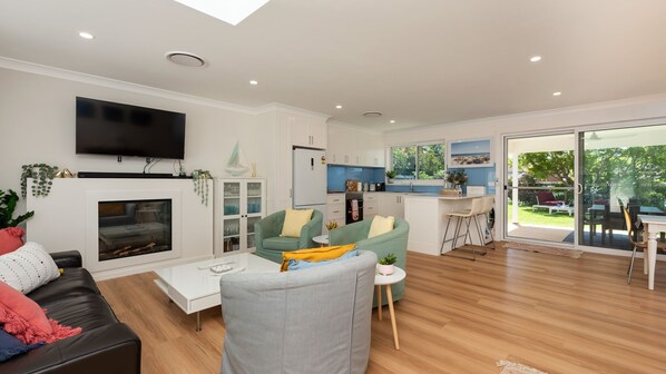 Smart TV, fireplace, books