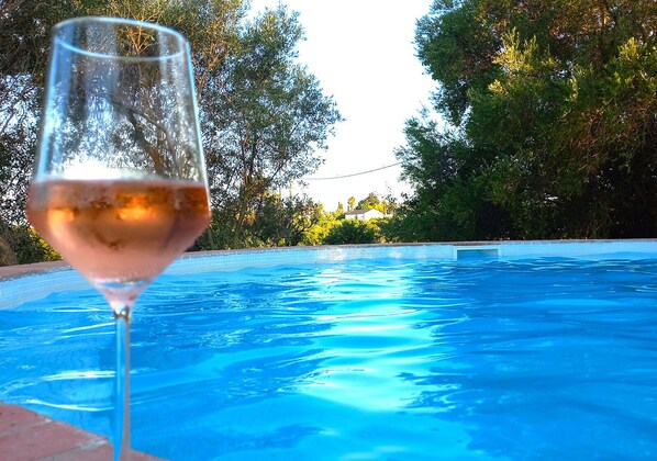 Outdoor pool, pool umbrellas, pool loungers