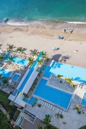 On the beach, sun-loungers, beach towels