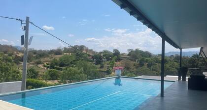 Surrounded by nature, cozy, modern.