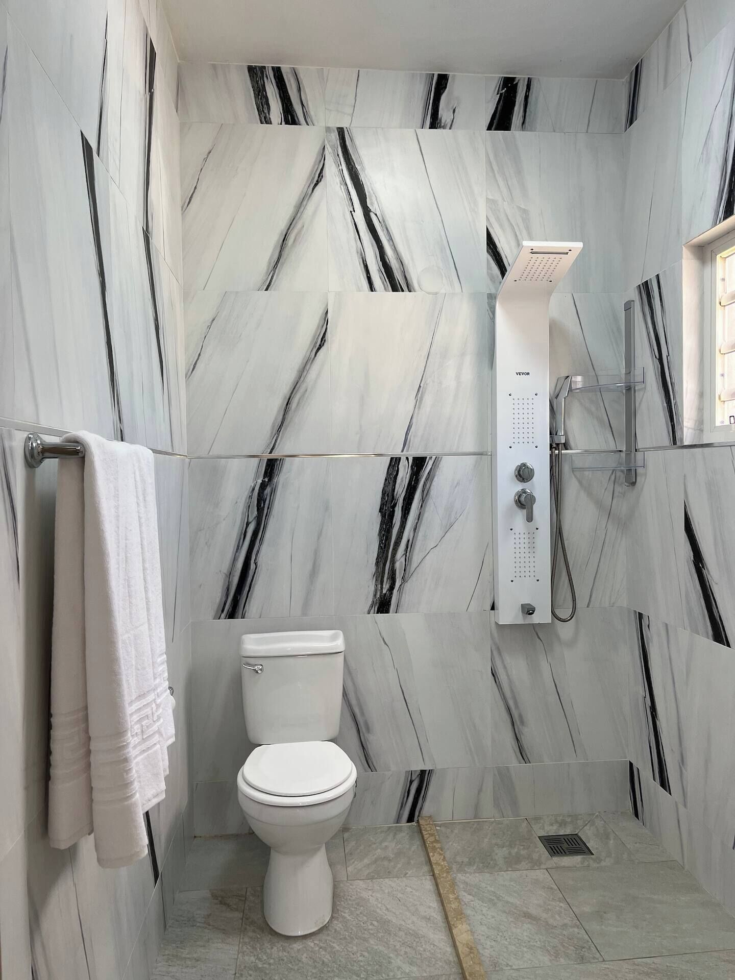 Hair dryer, towels, soap, toilet paper