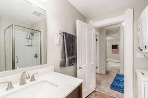 Hair dryer, towels, soap, toilet paper