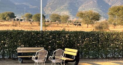 Spacious 9-bedroom villa with WiFi, AC in charming Islamabad
one meting hall.