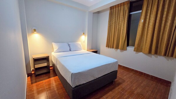 Comfort Room, City View | Desk, laptop workspace, free WiFi, bed sheets