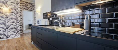 Fridge, microwave, stovetop, coffee/tea maker