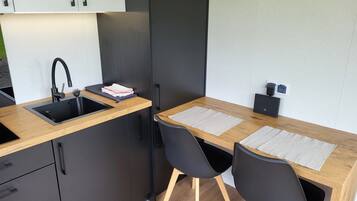 Fridge, microwave, stovetop, coffee/tea maker