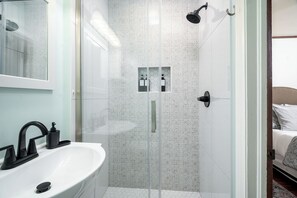 Hair dryer, towels, soap, shampoo