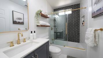 Hair dryer, towels, soap, toilet paper
