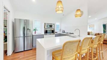 Coffee/tea maker, fridge, microwave, oven