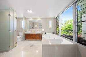 Shower, hair dryer, towels, shampoo