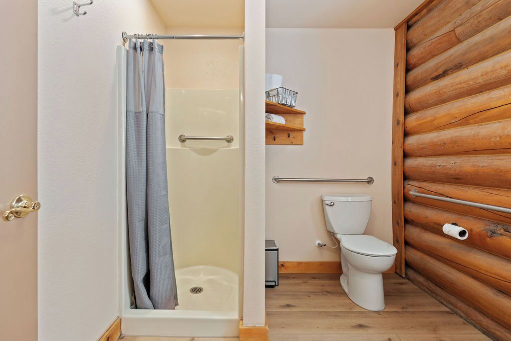 Shower, hair dryer, towels, toilet paper