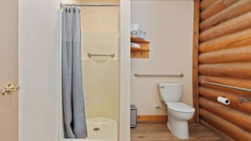 Shower, hair dryer, towels, toilet paper