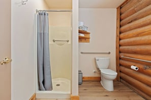 Shower, hair dryer, towels, toilet paper