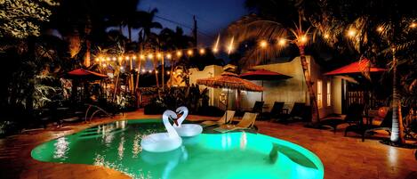 Outdoor pool, open 9:00 AM to 9:00 PM, pool umbrellas, pool loungers