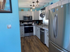 Microwave, oven, stovetop, dishwasher - Outerbanks 3 bedroom, 2.5 bath house canal front with dock (Kill Devil Hills)