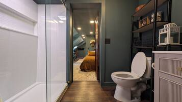 Shower, towels, soap, toilet paper