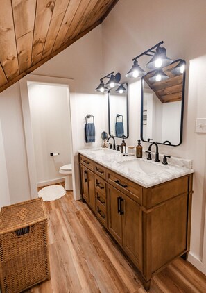 Shower, towels, soap, toilet paper
