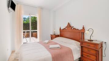 2 dormitorios, tabla de planchar con plancha, wifi gratis y ropa de cama