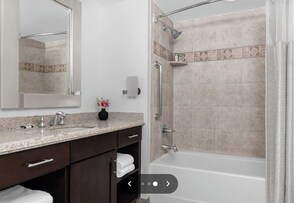Hair dryer, towels, soap, toilet paper