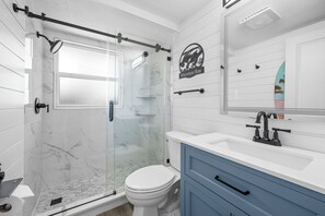 Shower, hair dryer, towels