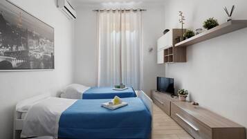 2 habitaciones, tabla de planchar con plancha y wifi gratis