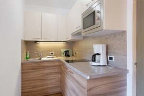 Fridge, microwave, stovetop, electric kettle