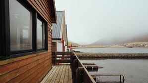 Unclassified image, 2 of 17, button - Neystastova |Waterfront Boathouse (Hvalvik)