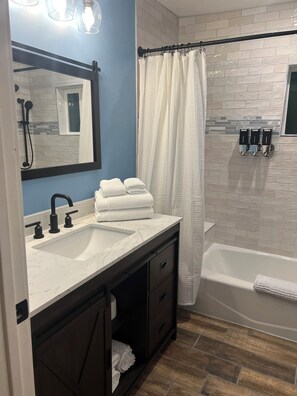Hair dryer, towels, soap, shampoo