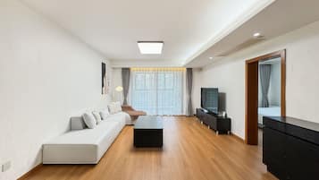 Senior Suite, 3 Bedrooms, Non Smoking, Kitchen | Living area | 55-inch LCD TV with digital channels