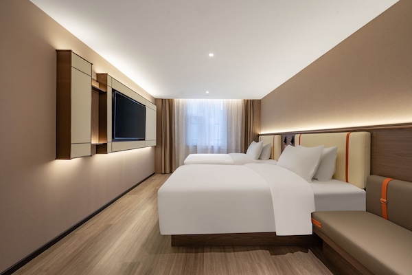 Executive-Zweibettzimmer | Daunenbettdecken, kostenlose Minibar, laptopgeeigneter Arbeitsplatz