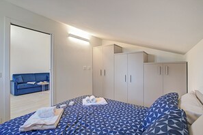 1 chambre, fer et planche à repasser, Wi-Fi gratuit, draps fournis
