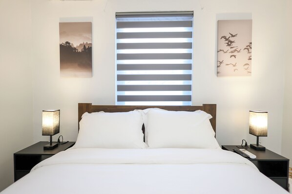 1 chambre, fer et planche à repasser, Wi-Fi gratuit, draps fournis