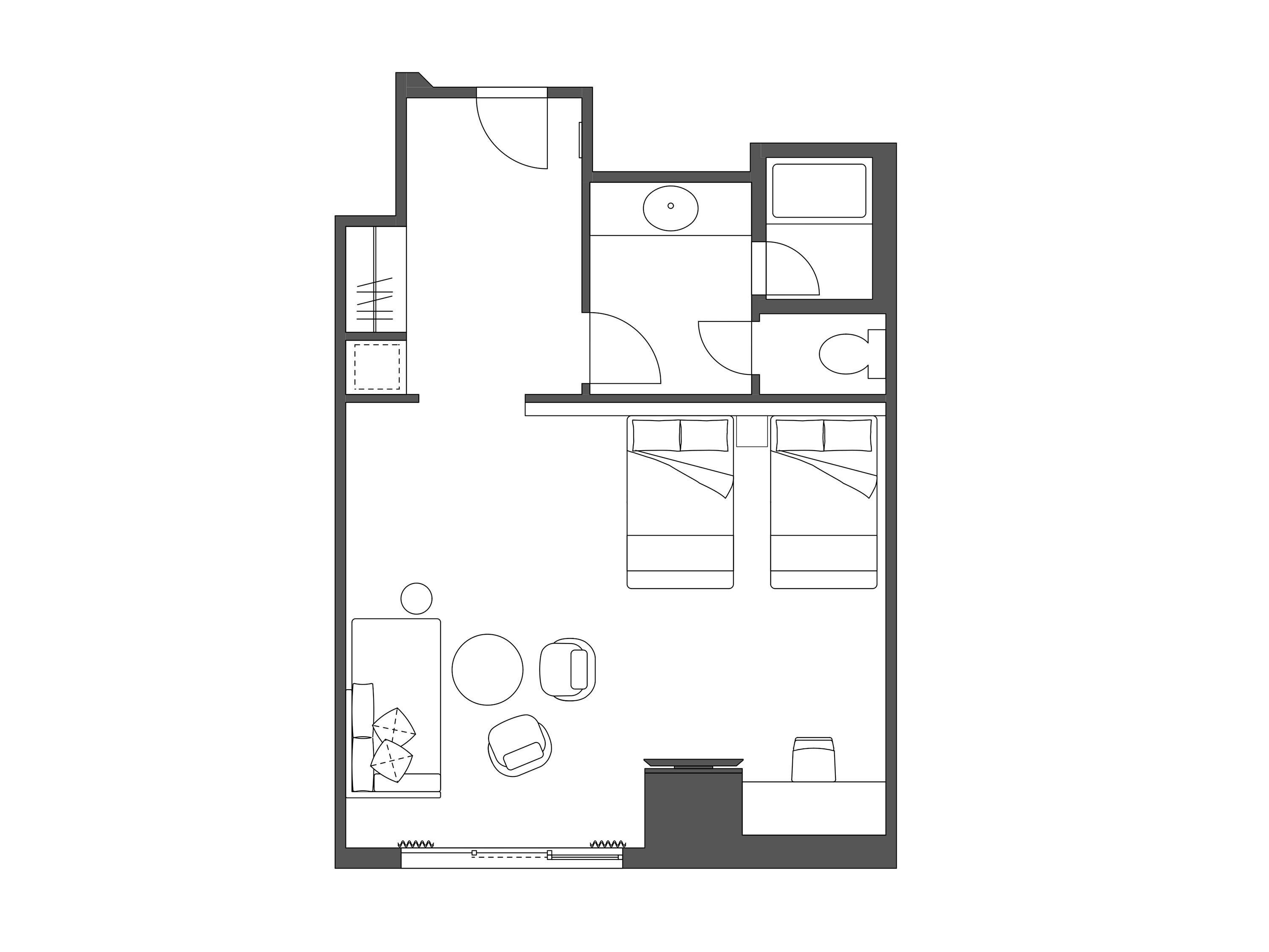 A floor plan of a hotel room with a bathroom, a kitchenette, a living area with a sofa and a TV, and a small balcony.