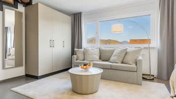 Deluxe Duplex, Balcony, Mountain View | Living area | TV