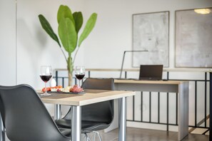 Deluxe Duplex, Balcony, Mountain View | In-room dining