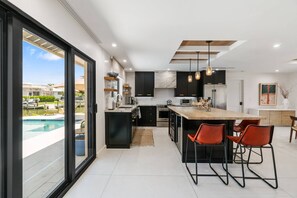 Fridge, microwave, oven, stovetop - New! Stunning, Serene Waterfront Home; Pool & Spa, Wifi & More ~Centrally Located to Island Hotspots (Marco Island)