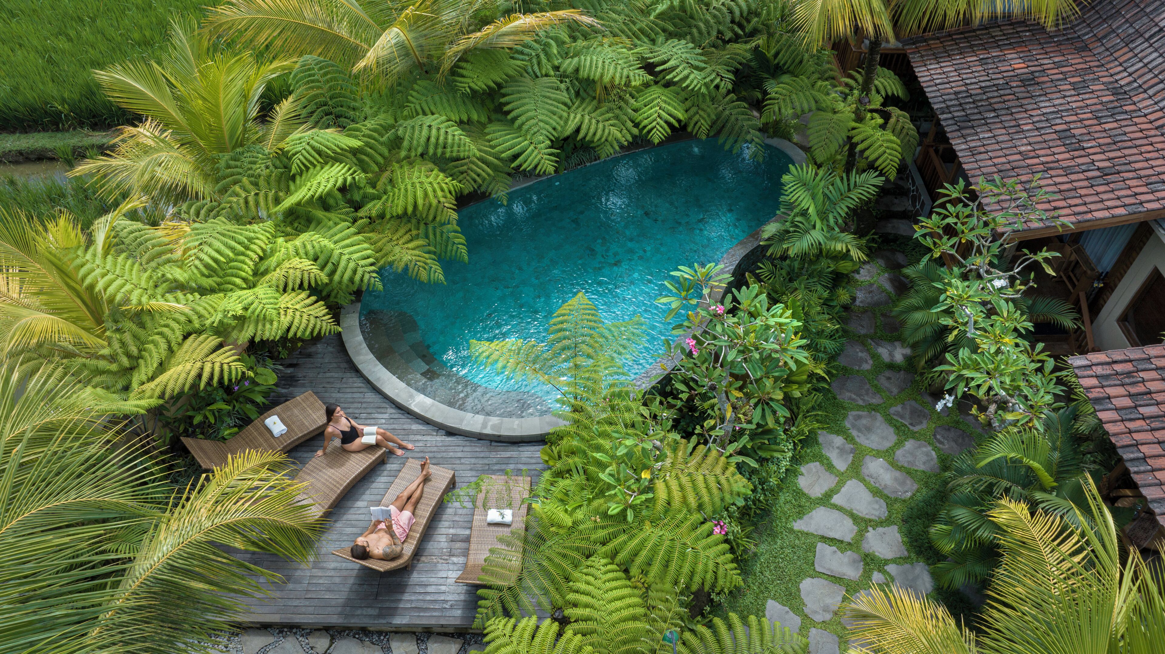 Outdoor pool, open 7:00 AM to 9:00 PM, pool loungers
