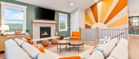 TV connectée, cheminée, jeux vidéo, table de tennis de table