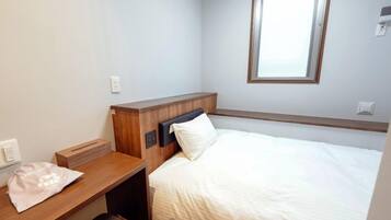 Desk, free WiFi, bed sheets