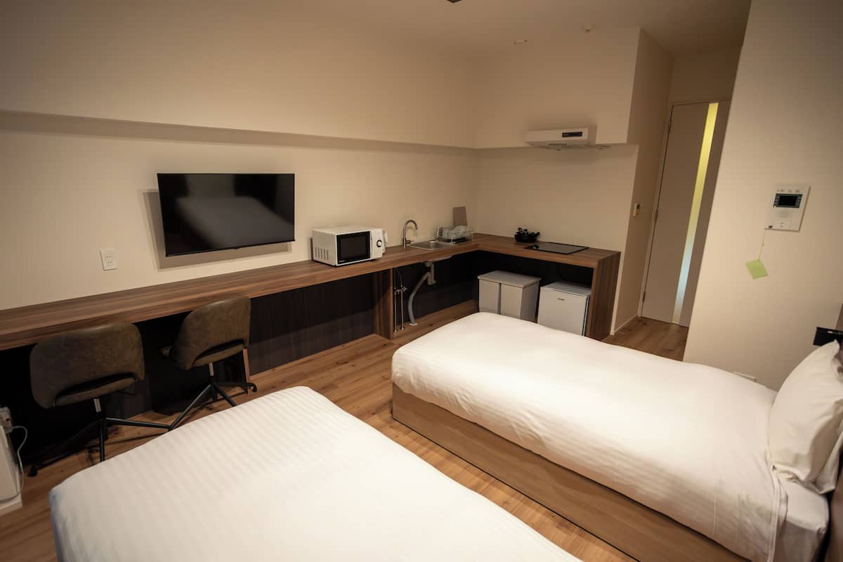 Basic tvåbäddsrum - 2 enkelsängar - icke-rökare - pentry | Ljudisolering och gratis wi-fi