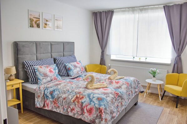 2 habitaciones, tabla de planchar con plancha, cuna de viaje y wifi 