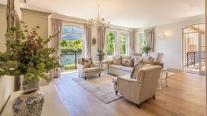 One Bedroom Lake View Villa 11A | Living room | 40-inch Smart TV with digital channels - W-Collection Franschhoek at  L'Ermitage  (Franschhoek)