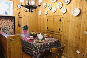 Dining - GuestHost - Cosy 85 sqm flat on 2 levels for 4 people, on the 3th floor of a typical mountain-style building (WITHOUT LIFT with stairs to access it).We are located in La Thuile, an Alpine resort famous for its ski slopes and peaceful atmosphere, close to (La Thuile)