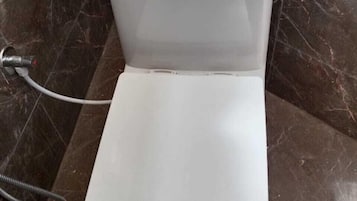 Shower, slippers, towels, soap
