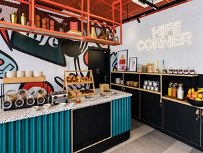 A kitchenette with a coffee station, shelves with jars, and a neon sign reading 'HIFE CORNER'. - Hife Bordeaux (Bordeaux)