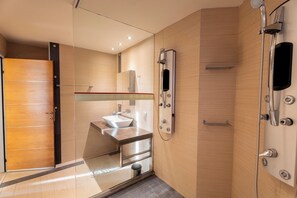 Shower, hair dryer, towels, soap