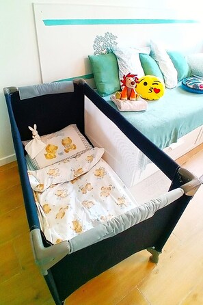 Desk, iron/ironing board, travel cot, free WiFi