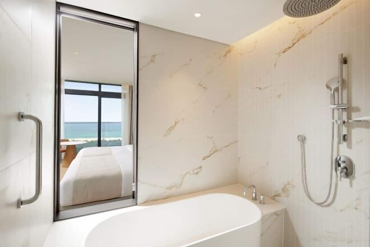 Bathroom | Separate tub and shower, hair dryer, bathrobes, slippers