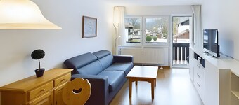 Appartement 'Mit Bergblick, Pool, Sauna' avec vue sur les montagnes, jardin partagé et Wi-Fi