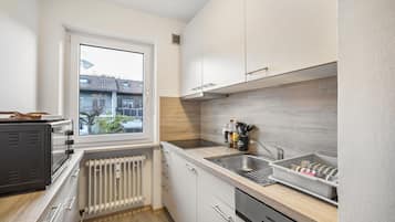 Refrigerador, horno, placa de cocina, lavavajillas